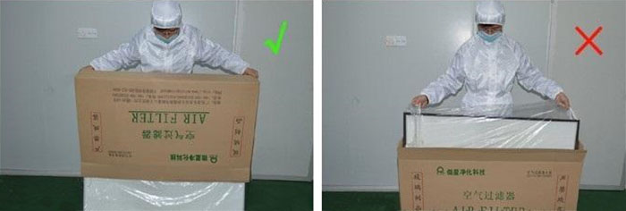 把高效過濾器慢慢倒出來，把紙箱放一邊查看高效過濾器是否損壞